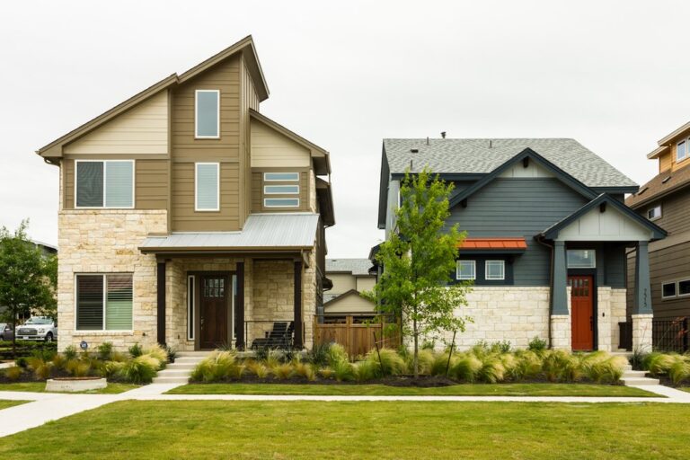 photo of new constructed homes with beautiful lawn and garden
