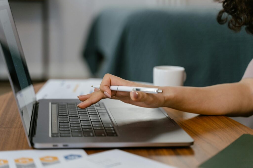 a person at a desk using a computer