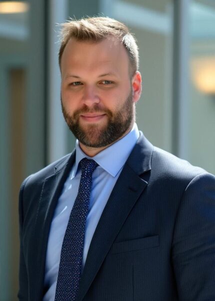 a professional photo of Austin Moore, Realtor